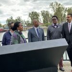 SUNY Chancellor John B. King and SUNY Empire Alum Robin Hodges view the African American Veterans Memorial in Buffalo, NY.