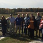 A photo of participants of the 2017 Revolutionary War Residency standing together in a field