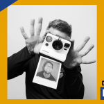 Person holding a Polaroid camera with a photo printing out in black and white, next to SUNY Empire Deep Dive logo.