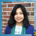 Graphic with a blue-toned background featuring a portrait of Mizuho Johnson with dark shoulder-length hair standing in front of a brick wall. A SUNY Empire shield logo appears in the top left, and “Class of 2026” appears in the bottom right with a graduation cap icon.