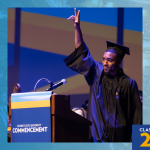 Jakeith Mosley in cap and gown stands at a podium labeled “Empire State University Commencement,” raising one hand with two fingers extended; blue and gold graphics frame the image, including a torch logo and “Class of 2026.”