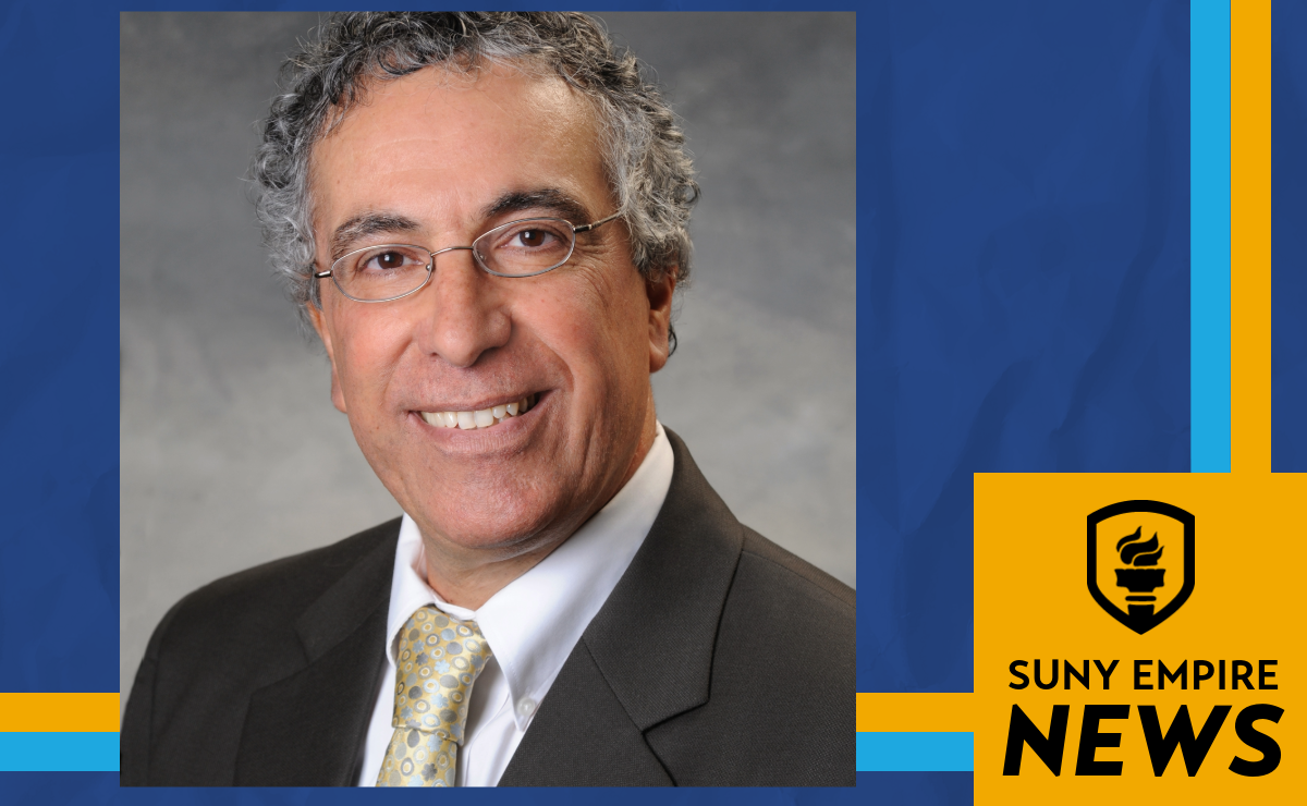 a photo of Alan Belasen framed by the blue, orange, and black "SUNY Empire News" graphic