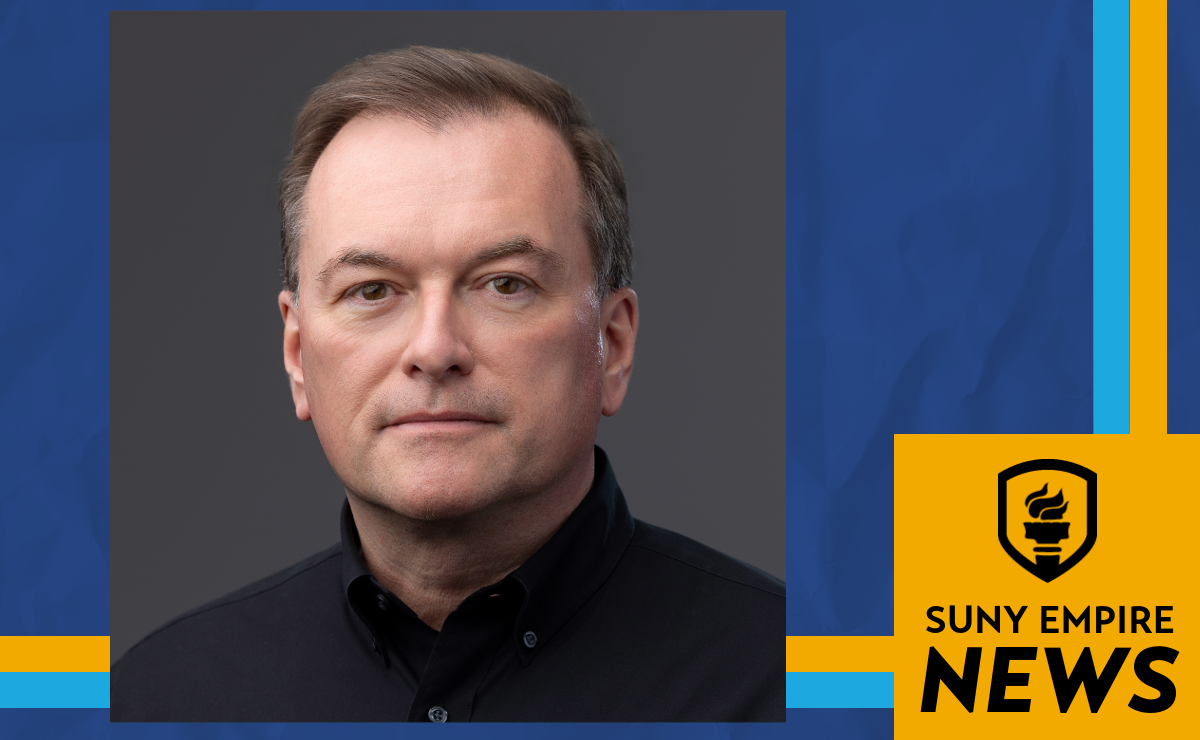 Portrait of a man wearing a black shirt, displayed on a SUNY Empire News graphic.